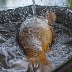 Trakker DPM Crib, Ovale Abhakmatte -Trakker Geschaft trakker dpm oval crib in use 2